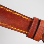 Cinturino vintage cognac con cucitura perimetrale patina